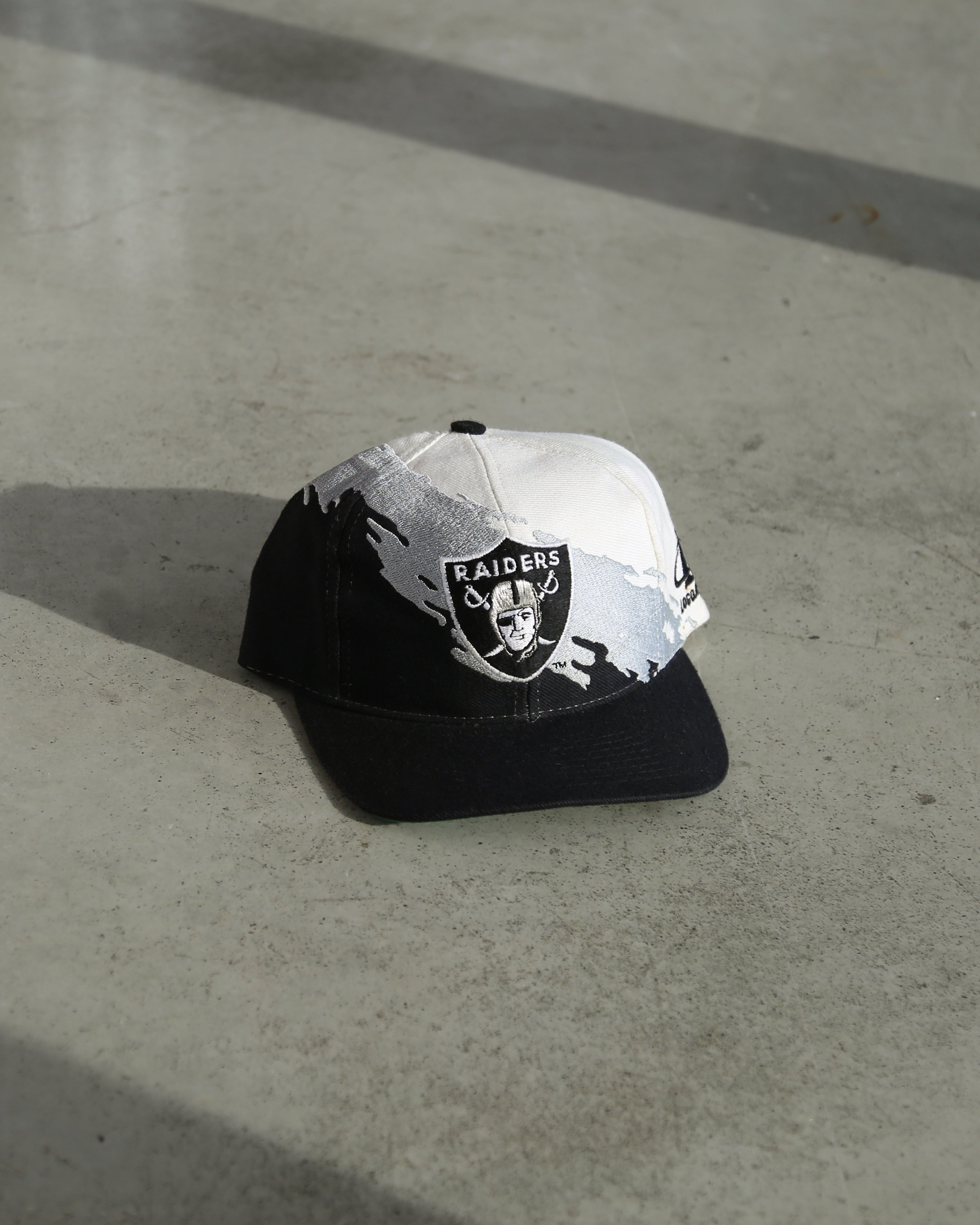 Vintage 90s Raiders NFL Splash Snapback Hat